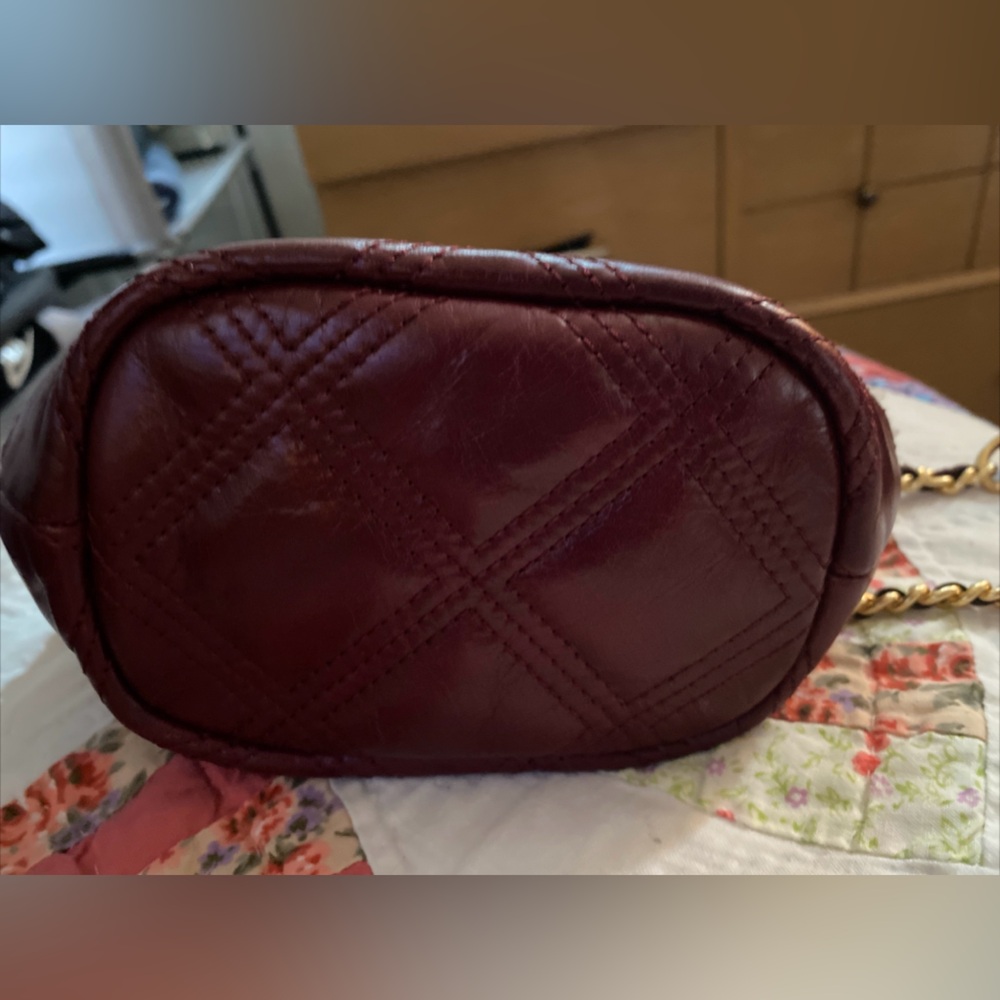 Tory Burch tweed mini bucket bag.
